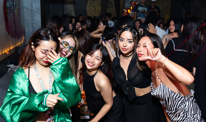 Friends posing together on a night out